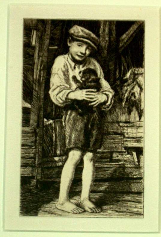 BOY HOLDING DOG