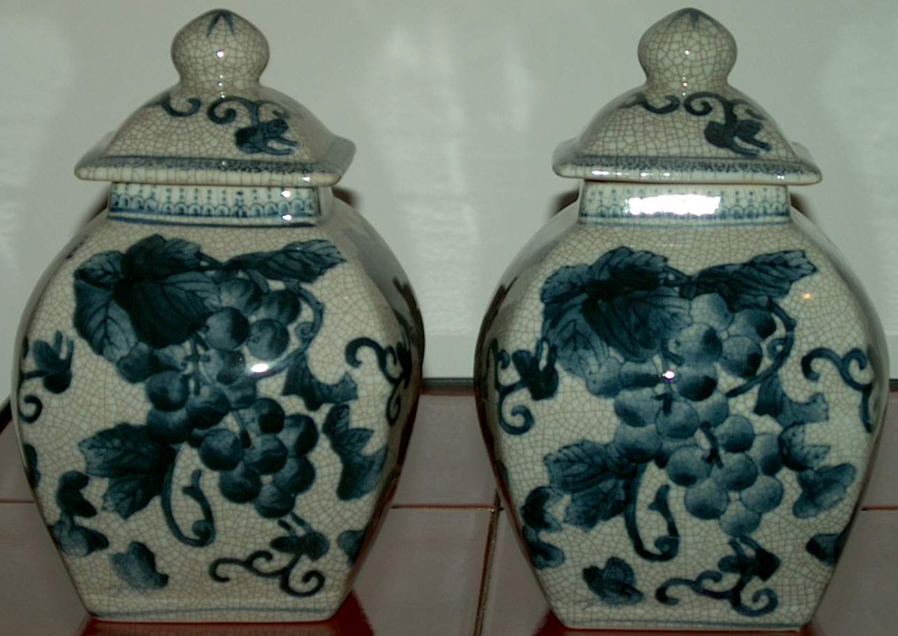 PAIR OF CHINESE BLUE AND WHITE COVERED JARS
